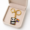 Exklusiver Panda Schlüsselanhänger mit Progress-Flagge – Gold-Edition – LGBTQ+ Pride Accessoire - Love-Union.de