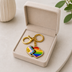 Exklusiver Doppelherz Schlüsselanhänger – Progress-Pride Edition – Gold-Edition – ProudYou